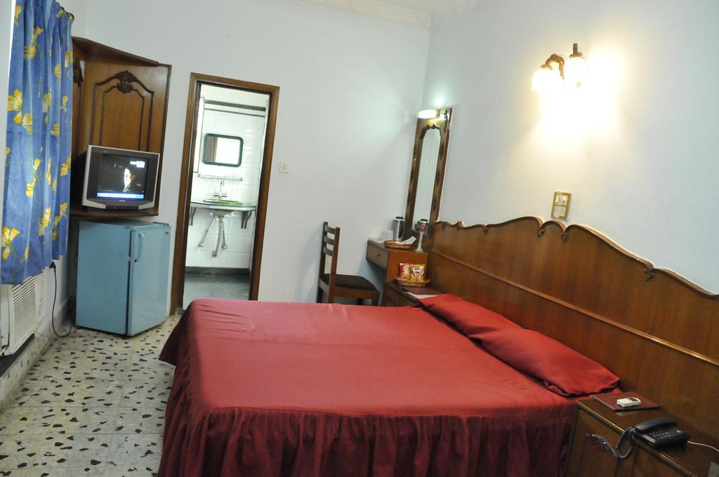 Hotel Heera Calcutá Quarto foto